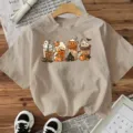 Halloween pumpkin ghost coffee cup graphic short sleeve casual beige t-shirt for women. - Apricot