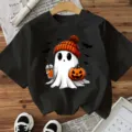 Black Halloween short-sleeve T-shirt featuring a cute ghost graphic with pumpkin and beanie. - S / Cotton Style Black