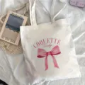 Grand sac cabas en toile blanche avec joli noeud rose pour un usage quotidien. - Imprimé Nœud