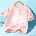 Pink kids t-shirt with cute white pumpkin graphic, short sleeve casual top for Halloween gift. - 110cm / Cotton Pink
