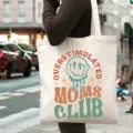 Detailed shot of canvas tote bag with graphic print, casual shoulder bag style for daily commuting. - Style 7