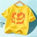 Kids yellow short sleeve t-shirt featuring a fun Halloween pumpkin print graphic design top. - Yellow