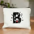 Trousse de maquillage zippée en toile blanche avec imprimé lettre B style cartoon. - Lettre Joyeux Noël Style B