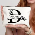 Trousse de toilette en toile personnalisée avec design de lettre vintage D pour le maquillage. - Lettre D