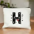 Wit canvas make-up etui met schattige cartoon letter H print, stijlvolle reistas. - Letter H Stijl