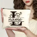 Trousse de maquillage personnalisée en toile avec motif de lettre et nom sur mesure. - L