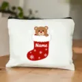 Vue détaillée d'une trousse de maquillage personnalisable de l'ours de Noël avec nom imprimé. - Style 9