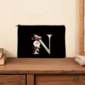 Custom floral letter N black cosmetic bag makeup clutch purse with smooth zipper closure. - Letter N