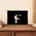 Floral letter F black cosmetic pouch with zipper closure, elegant custom monogram clutch. - Letter F