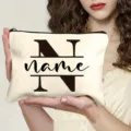Customized monogram 26 letter canvas cosmetic bag, simple stylish portable travel makeup pouch. - Letter N