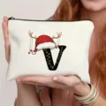Nahaufnahme des weihnachtlichen Buchstaben V Canvas Make-up-Beutels, festliches Design. - Buchstabe V