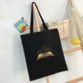 Μαύρη τσάντα shopper από καμβά με χρυσή εκτύπωση βιβλίου, μεγάλη casual τσάντα ώμου. - Μαύρο Στυλ με Χρυσό Τύπωμα Βιβλίου (35x40cm)