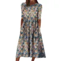 Casual floral midi dress featuring half sleeves, a round neckline, and convenient side pockets. - S / Blue