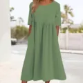 Casual green midi dress detail featuring loose fit, round neck, half sleeves, and handy side pockets. - S / Light Green