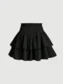 Primer plano de minifalda negra de volantes en capas con cintura alta elástica y estilo dulce. - S / Negro