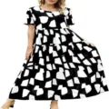 Black and white abstract print short sleeve tiered maxi dress detail view for summer wear. - Black