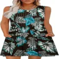 Detail view of women's sleeveless tropical print summer dress with round neck and pockets. - Pattern 1