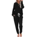 Detailed view of the black ribbed long-sleeve lounge set featuring buttons and comfortable drawstring pants. - M / Top And Bottom / Black