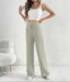 Vista dettagliata di pantaloni casual da donna in maglia a costole con coulisse vita. - Taglia M / Pantaloni e gonne / Albicocca