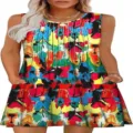 Close-up of colorful abstract print, sleeveless pleated design and side pockets. - Pattern 3