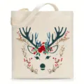 Close-up of the canvas tote bag featuring a cute Christmas reindeer and floral pattern design. - L / Off White