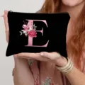 Black canvas makeup bag featuring large letter E with elegant pink floral rose design. - Letter E Style(5) / Black