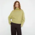 Detail shot of women's casual loose turtleneck knit sweater, soft fabric, elegant autumn wear. - S / Tops / Autumn Fragrance Green