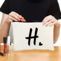 Canvas zipper cosmetic bag with custom letter H print, ideal for daily makeup storage. - Style H