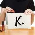 Custom letter K canvas cosmetic bag with zipper, minimalist makeup storage pouch for daily gifts. - Style K