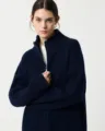 Close-up detail shot of the stylish dark navy blue ribbed knit half-zip cardigan sweater. - Navy Blue
