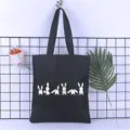 Black canvas tote bag detail view, cute rabbit print design, casual student handbag. - Style 11 / 35*40cm