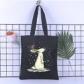 Black canvas tote bag with cute rabbit and bird print, casual shoulder shopping bag for students. - Style 2 / 35*40cm