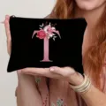 Close-up display of the black canvas cosmetic pouch featuring pink glitter letter T and floral art. - Letter T Style(20) / Black