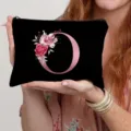Black canvas makeup bag detail, floral letter O print, zipper pouch close-up view. - Letter O Style(15) / Black