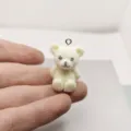 Mini white flocked resin bear charm DIY accessory for necklace keychain jewelry making. - Beige