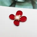 Red acrylic flower charm for diy jewelry making, cute floral pendant accessory detail view. - Red