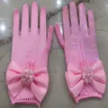 Pink mesh gloves for kids with big bow and pearl flower decoration, perfect for party and dress. - Pink