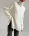 Oversized white turtleneck sweater for women, comfortable long sleeve knit pullover top. - White