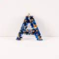 Blue stone and gold foil resin letter A keychain pendant, fashion DIY accessory. - Letter A