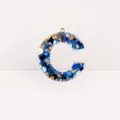 Blue resin letter C pendant with gold flakes and stone chips, DIY keychain accessory. - Letter C