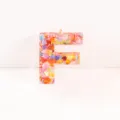 Pink resin letter F keychain charm with colorful glitter hearts for DIY jewelry accessories. - Letter F