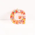 Epoxy resin letter G keychain pendant filled with colorful heart sequins DIY bag accessory - Letter G