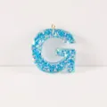 Blue glitter resin letter G pendant charm with gold ring for DIY keychains and jewelry making. - Letter G