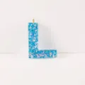 Blue resin letter L pendant keychain bag accessory with glittering sequins and gold jump ring. - Letter L