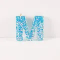 Blue resin letter M keychain with shimmering flakes, perfect for DIY bag charms and accessories. - Letter M