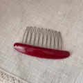 Oval acetate insert comb with metal teeth, stylish hair accessory for versatile daily hair styling. - Red