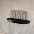 Elegant black acetate hair comb with metal teeth, perfect for women styling bangs and chic buns. - Black