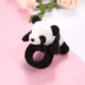 Close-up shot of the cute panda plush slap bracelet featuring a soft black and white bear toy. - Style 3 Black Slap Bracelet Panda