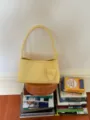 Yellow woven shoulder bag, stylish underarm hobo bag with top handle for daily commute. - Yellow