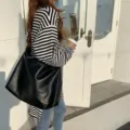 Minimalist black leather slouchy shoulder bag, large capacity daily tote for women and girls. - Black